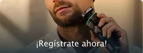 Hombre afeitándose con una maquina eléctrica Philips 